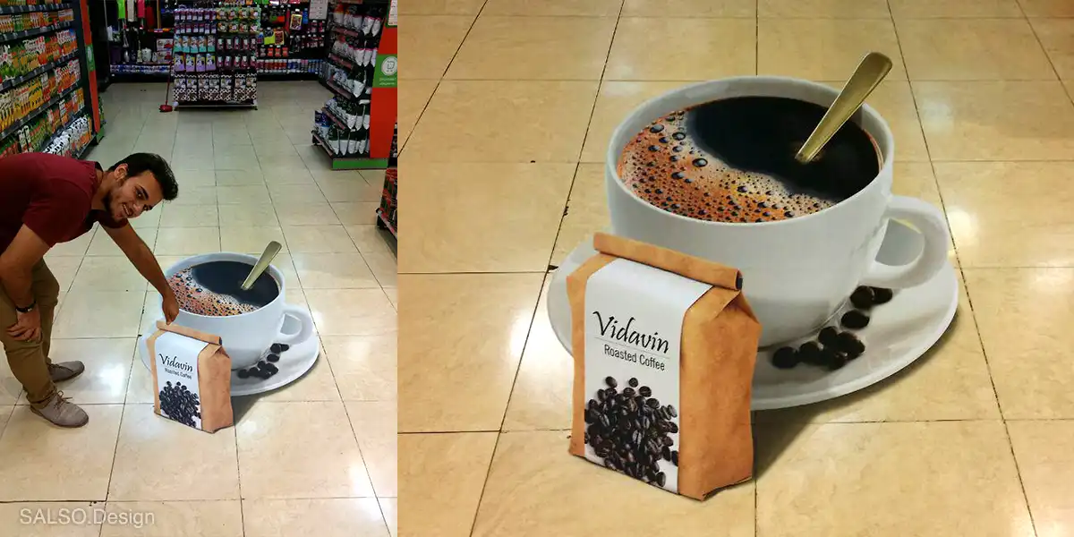 A 3D floor sticker showing a cup of coffee beside a coffee bag. realistic enough to make you crave a brew
